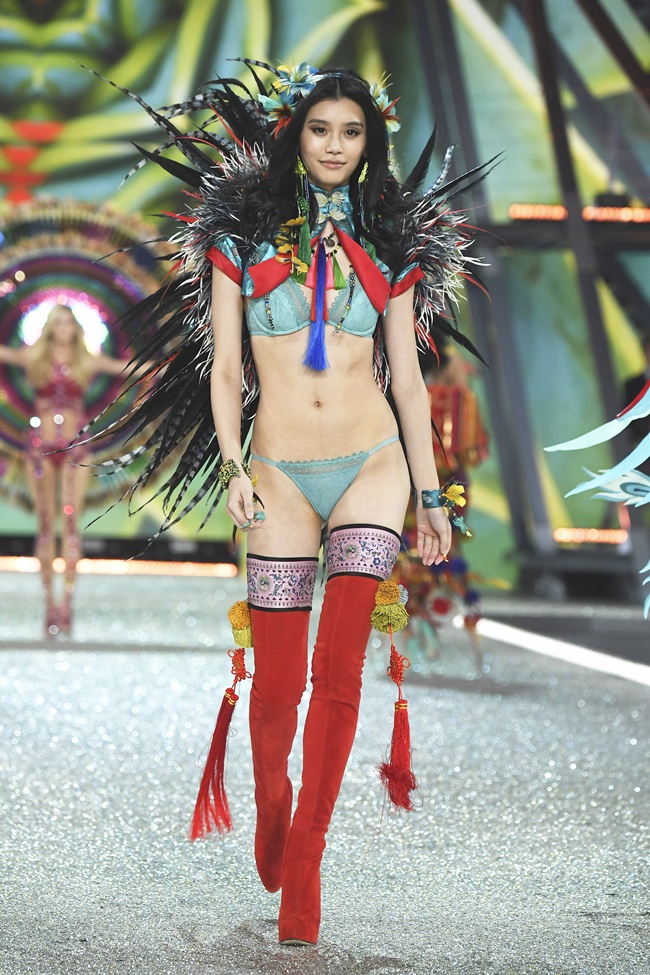 PARIS, FRANCE - NOVEMBER 30: Ming Xi walks the runway at the Victoria's Secret Fashion Show on November 30, 2016 in Paris, France. (Photo by Pascal Le Segretain/Getty Images for Victoria's Secret)