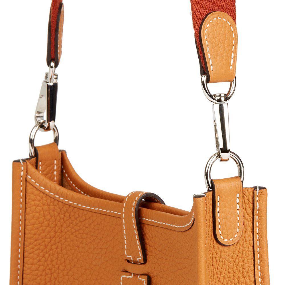 ราคา กระเป๋าแบรนด์ Hermes รุ่น Mini Evelyne สี gold